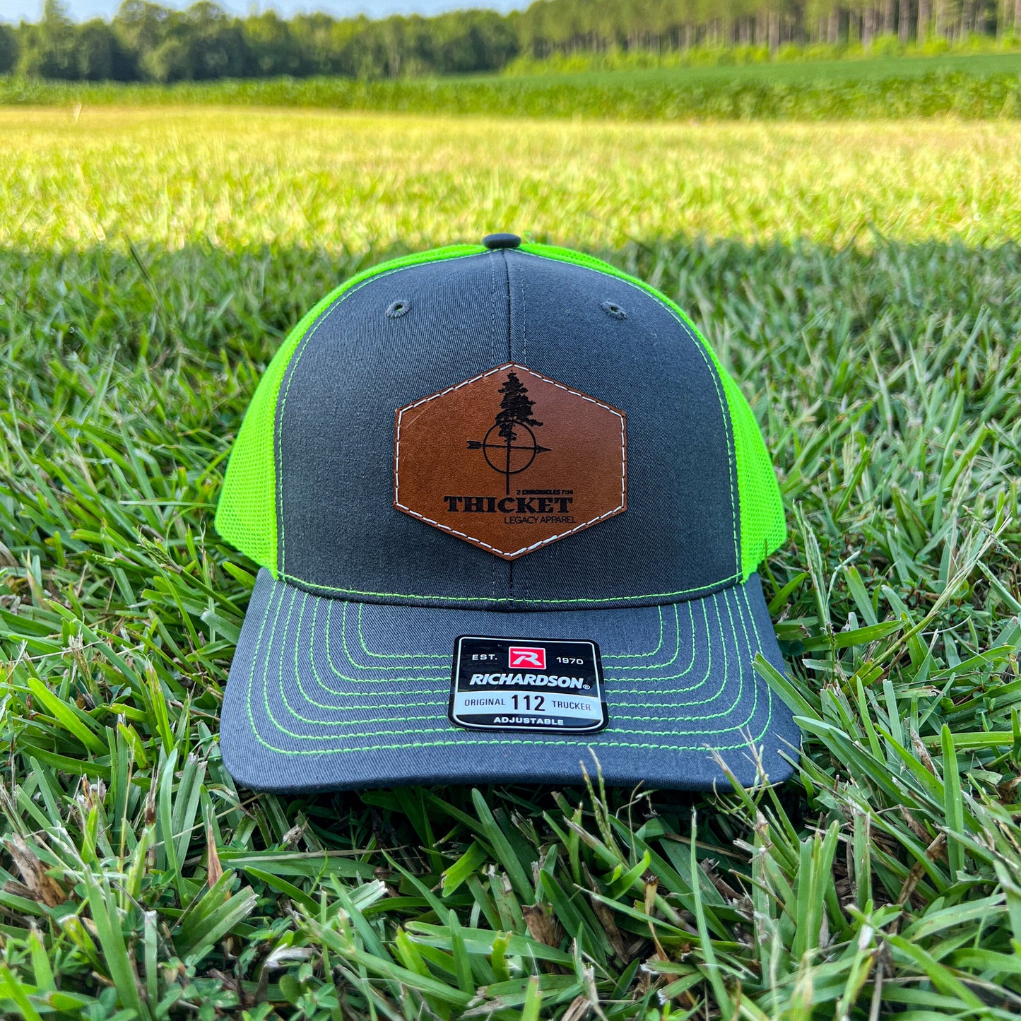 THICKET Logo Leather Patch Trucker Hat | Charcoal + Safety Green